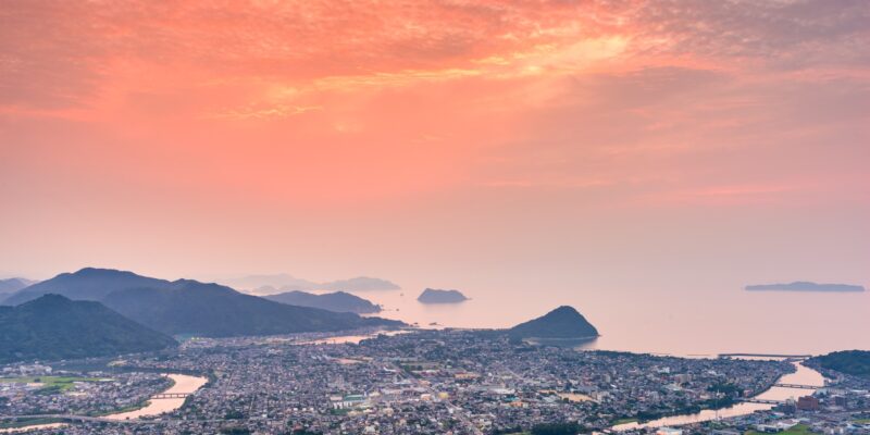 Hagi, Yamaguchi, Japan town skyline at dusk on the Sea of Japan.