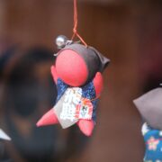 Sarubobo doll, Japanese amulet, in the town of Takayama in Gifu, Japan.